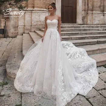 Свадебное платье с открытыми плечами, расшитое кружевом на сетке, с бальным платьем без бретелек, без рукавов, платье невесты сзади, без спинки.
